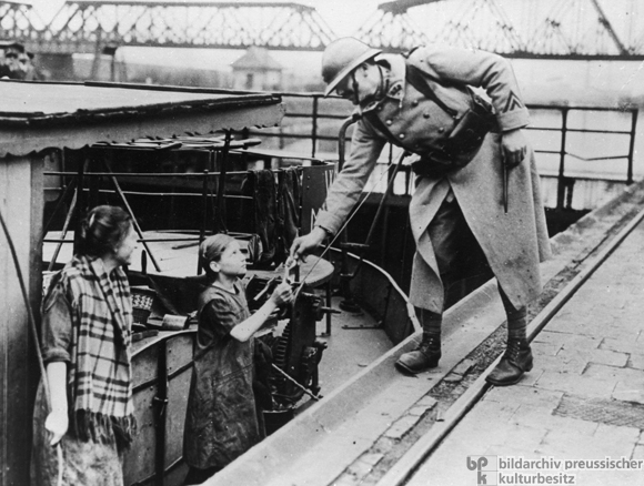 Inspecting a Barge along the Rhine-Herne Canal during the Occupation of the Ruhr Region (February 3, 1923)