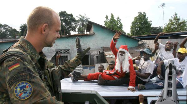 Bundeswehr Paratrooper Waves to Kinshasa Residents during a Patrol of the City (October 26, 2006)