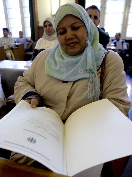 New German Citizen Holding Her Certificate of Naturalization (September 12, 2006)