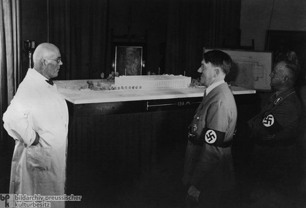 The Architect Paul Ludwig Troost with Hitler and Gauleiter Adolf Wagner before a Model of the House of German Art (1933)